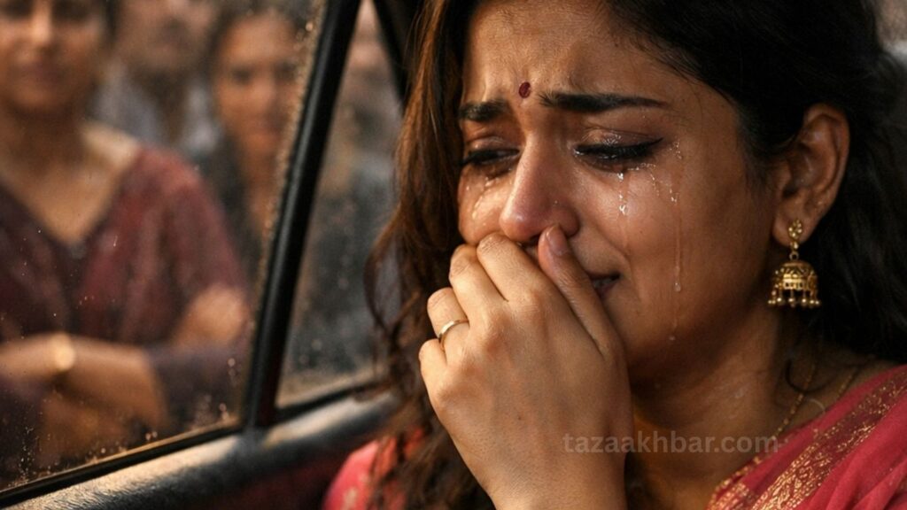 Close-up of a crying Indian woman in a car, symbolizing the emotional theme of 'Log Kya Kahenge'.